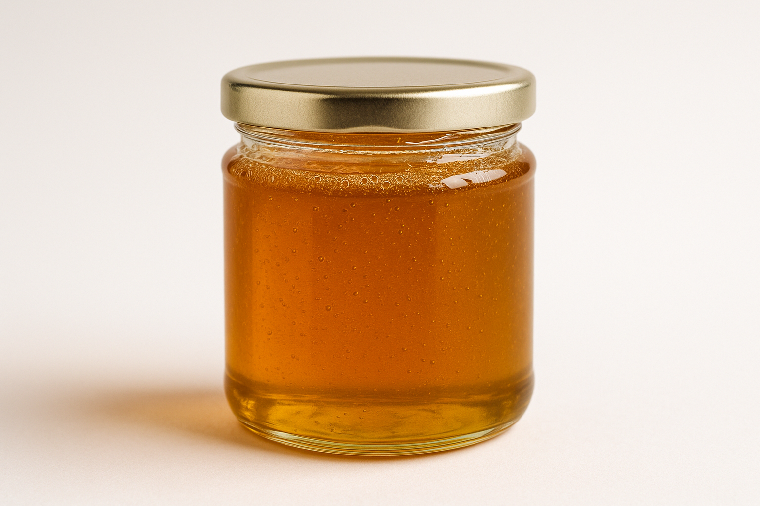 original raw and natural honey in a 4oz jar